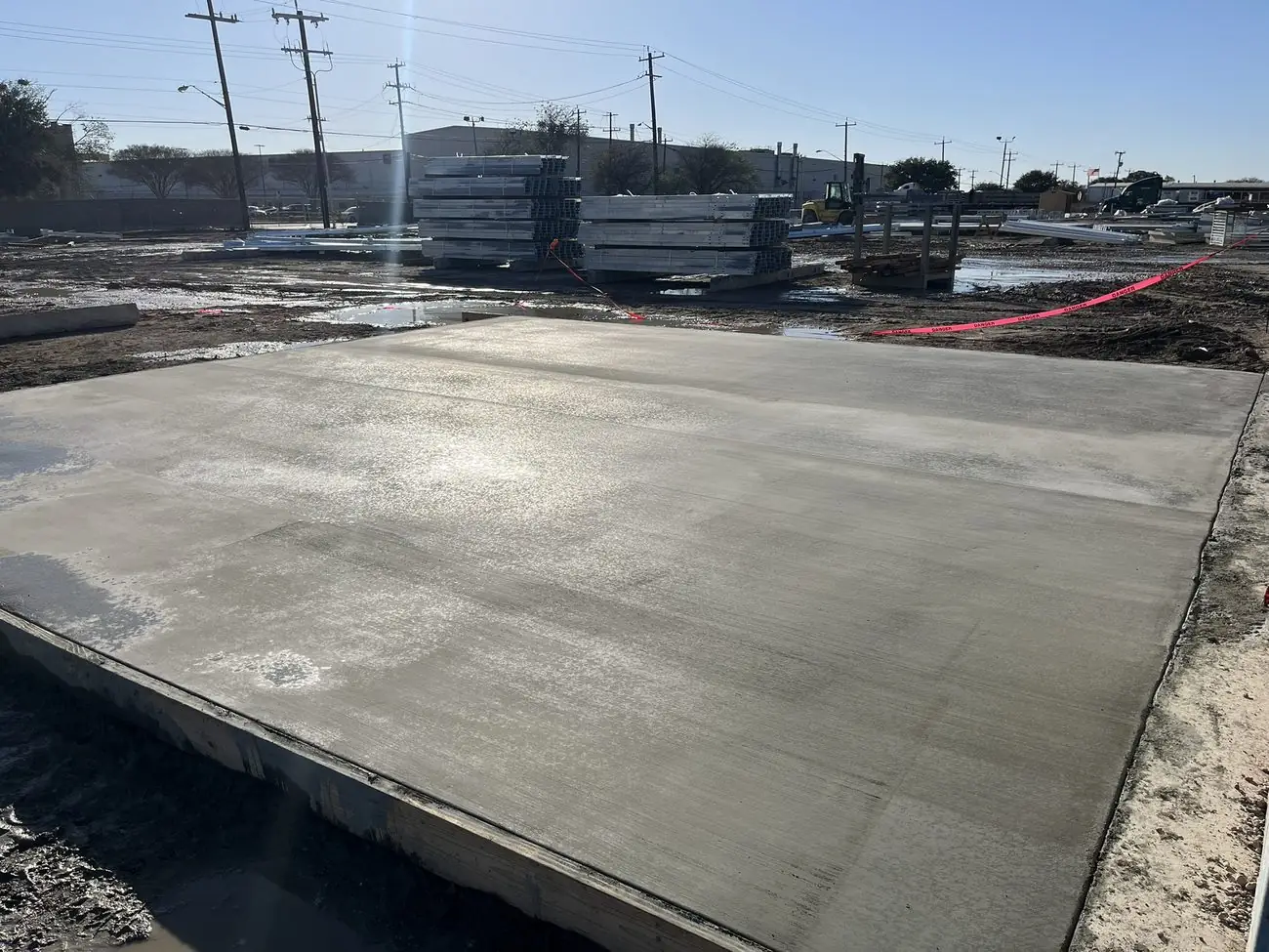 Wide broom-finish concrete walkway